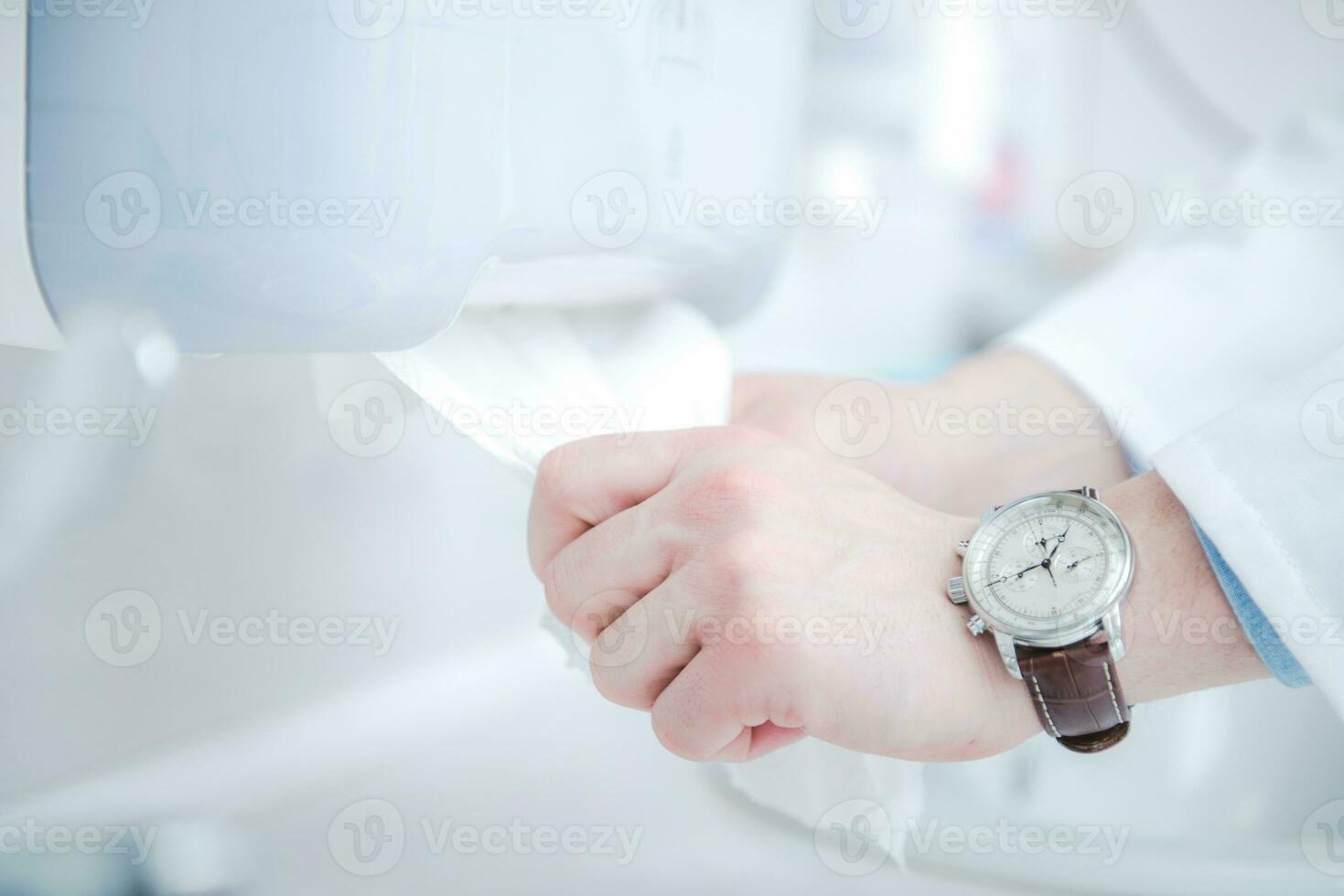 Using Sanitizing Velvet Wipes To Clean Hands photo