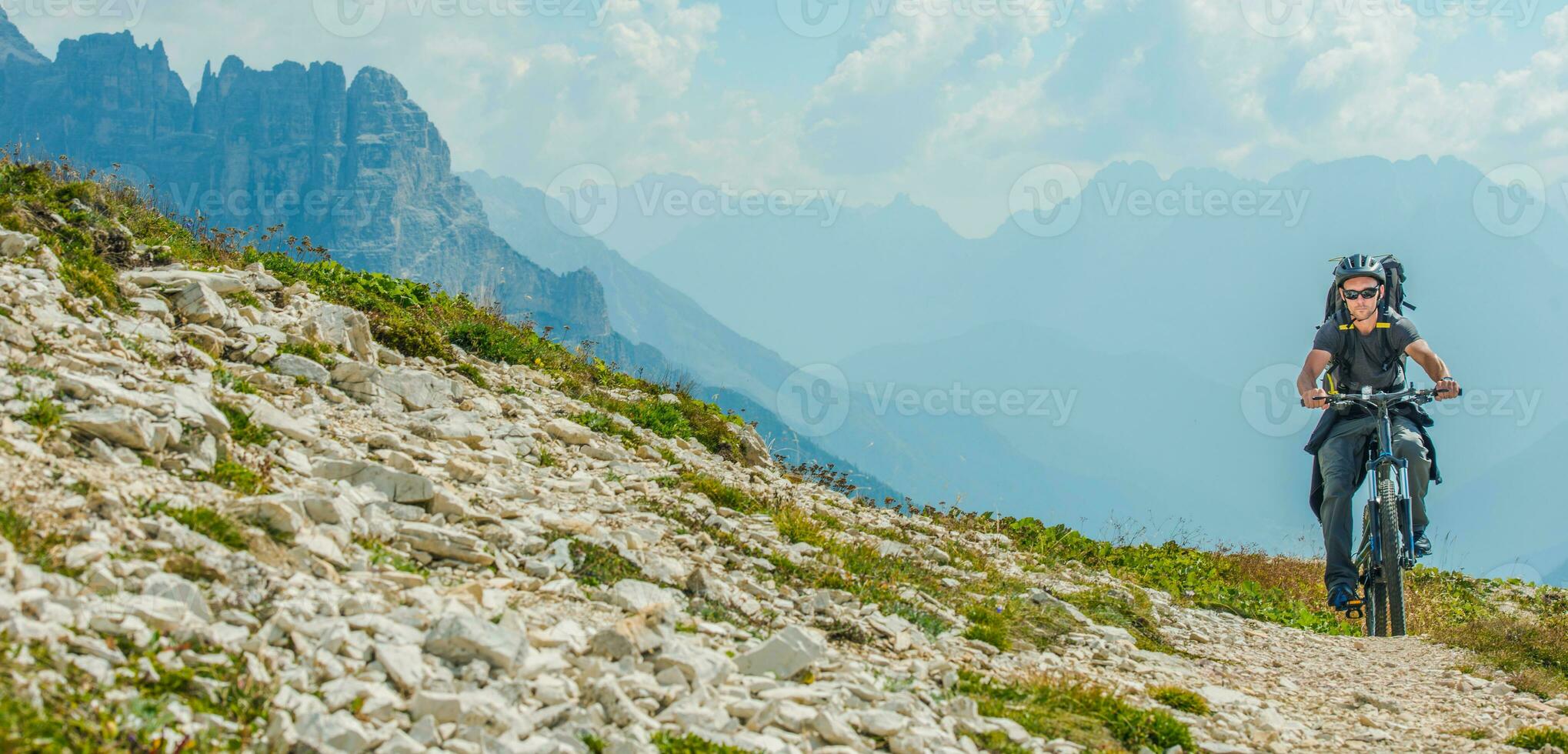 Caucasian Men Riding on Mountain Bike photo