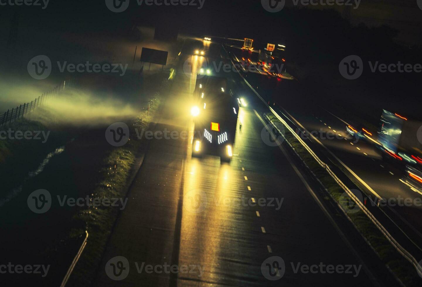 Foggy Highway Evening Traffic photo