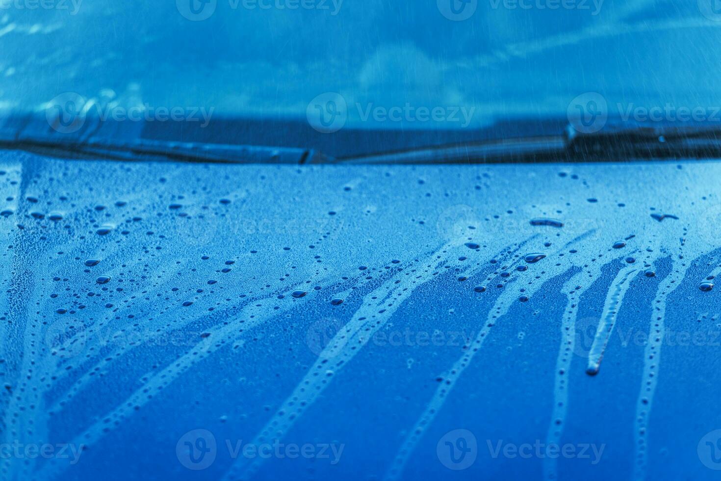 Wet Automobile Bonnet And Windshield. photo