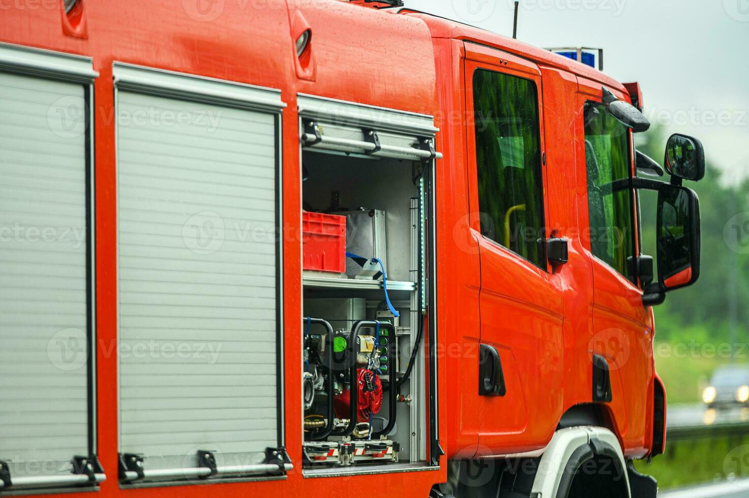 Fire Truck With Equipment Ready For Action. photo