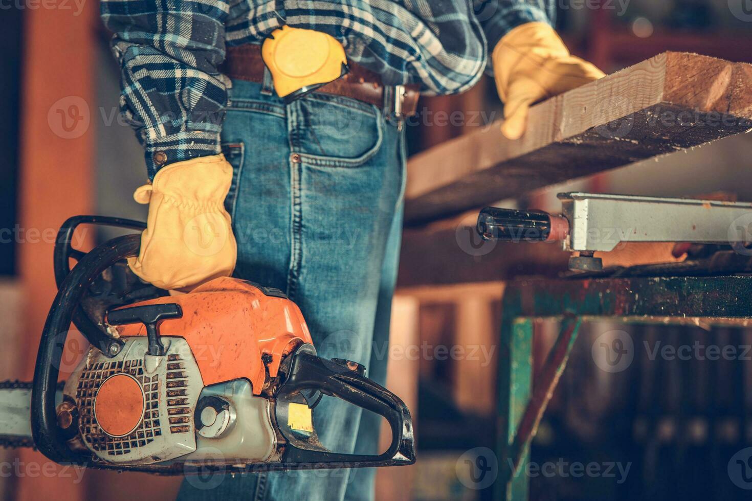 Men with Gasoline Saw Woodwork Project photo