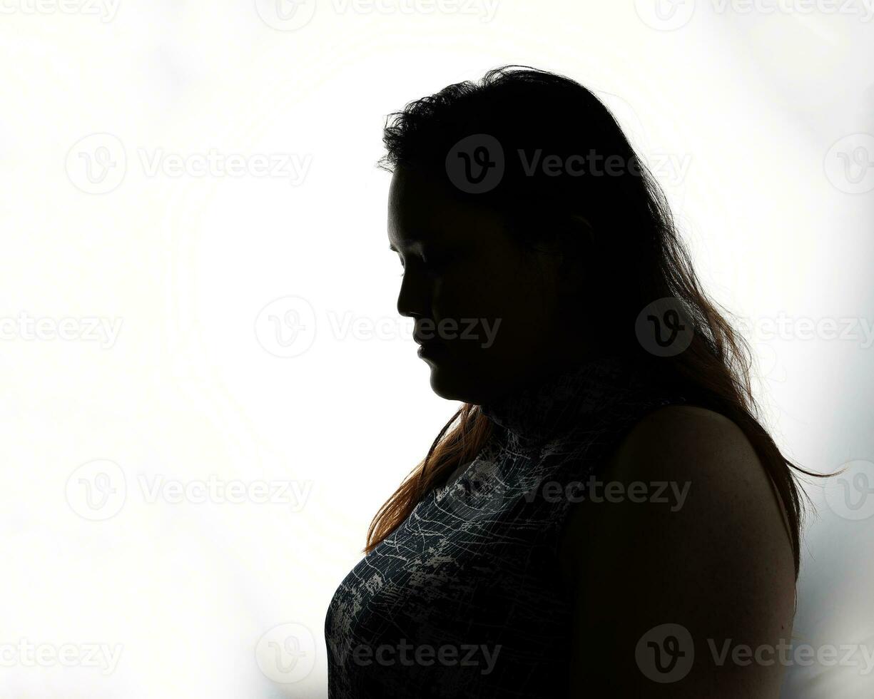 Silhouette dark black portraits of young southeast Asian woman on white background romance love care friends emotion expression thoughts photo