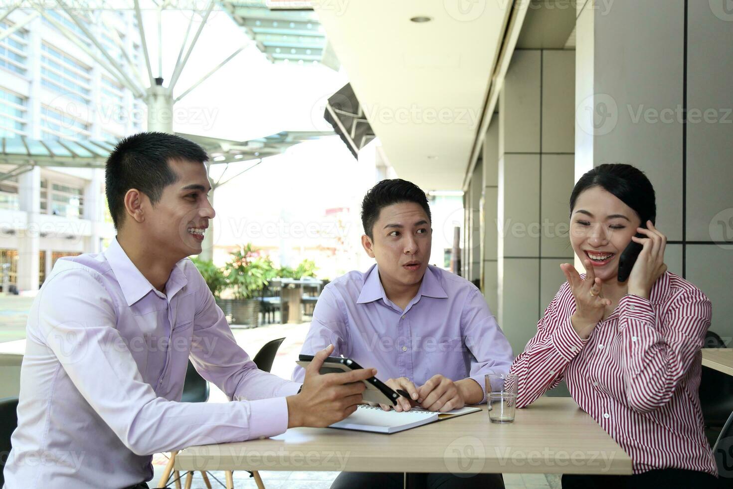 Young south east Asian middle eastern man woman business colleague outdoor stand pose photo