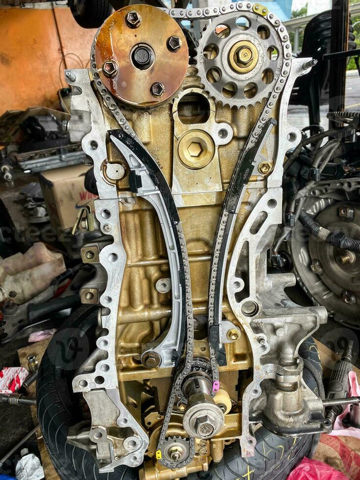 Car engine motor timing chain belt cover open for repair photo