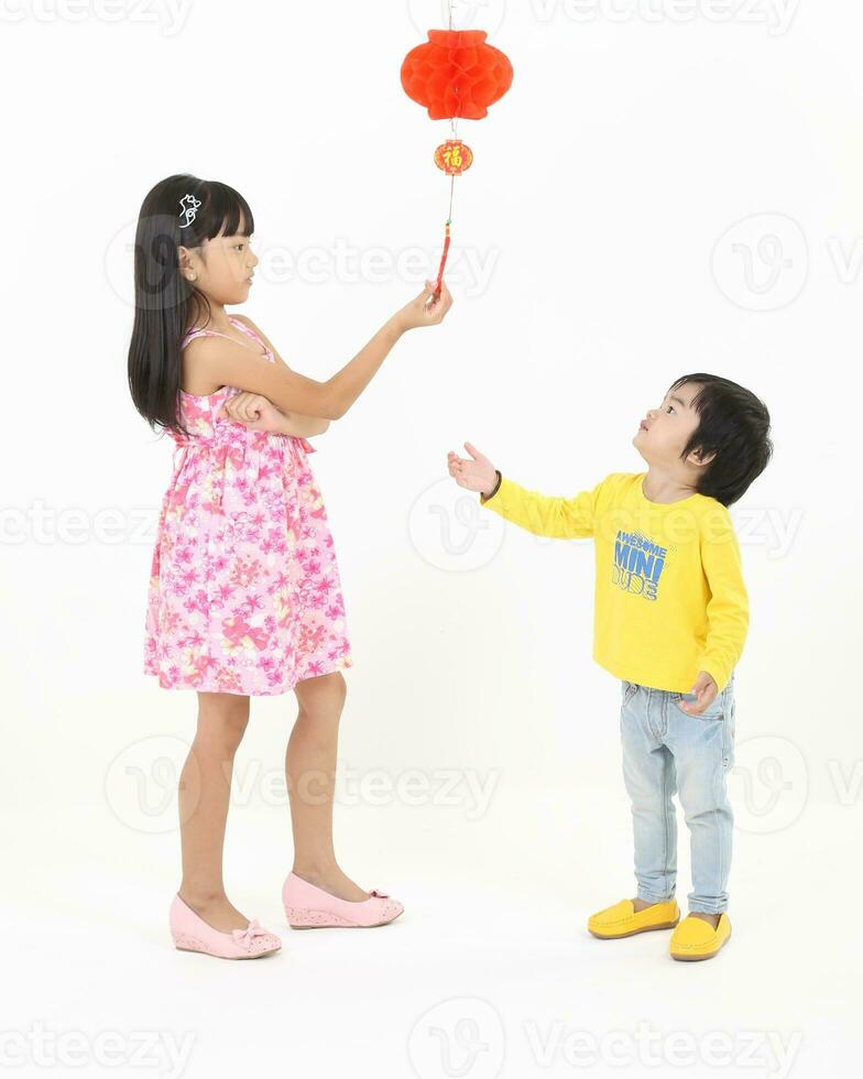 South East Asian young father mother daughter son parent boy girl child activity indoor photo