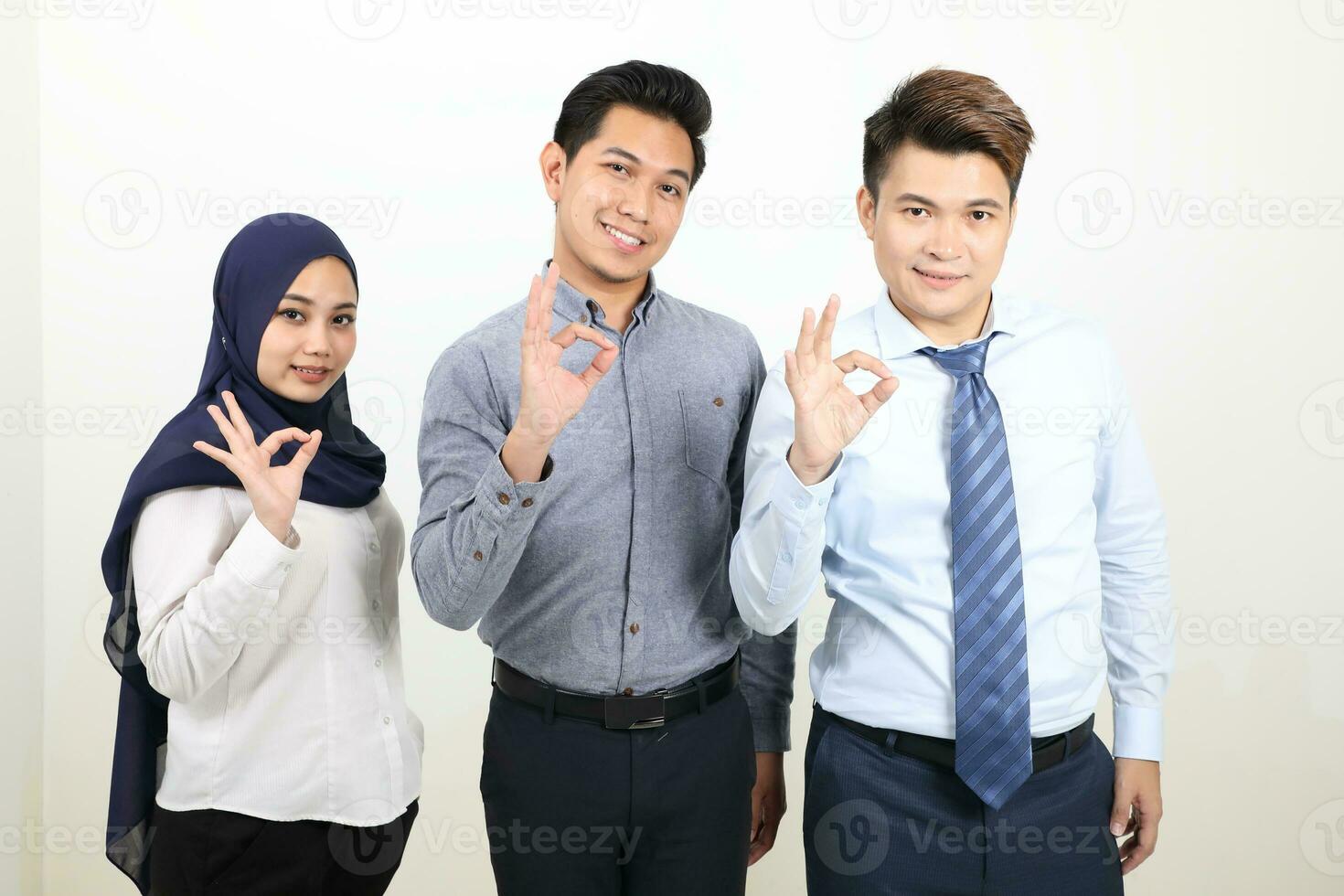 South east Asian Malay Chinese Man Woman facial expression stand ok finger sign photo