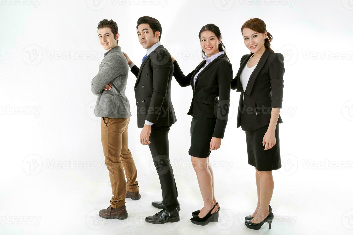 Southeast Asian middle eastern Caucasian young office business man woman wearing suit stand in a row que hand on shoulder chain unity togetherness expression on white studio background photo