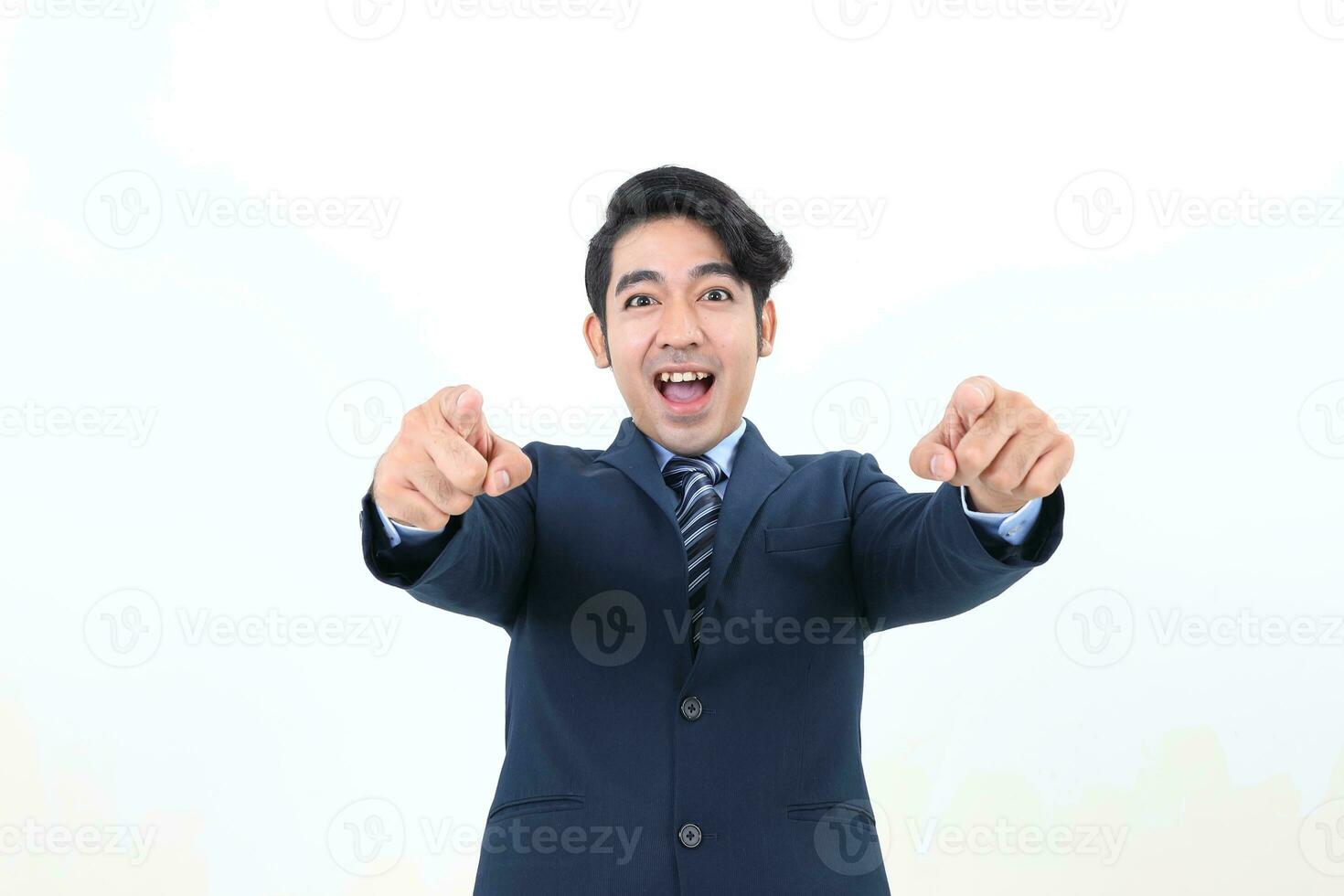 South east Asian Malay Man facial expression happy mouth open look forward at camera pint both hand at camera photo