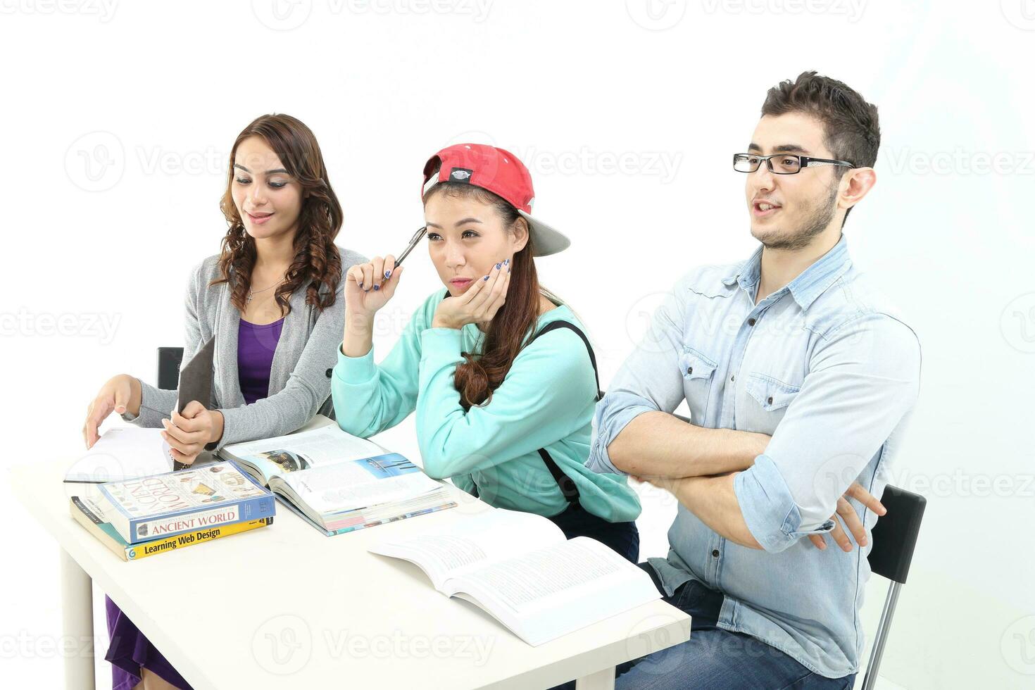 Yong south east Asian middle eastern Caucasian youth man woman in casual dress walk talk fun sit at table book notebook pen laptop computer study think read on white background photo