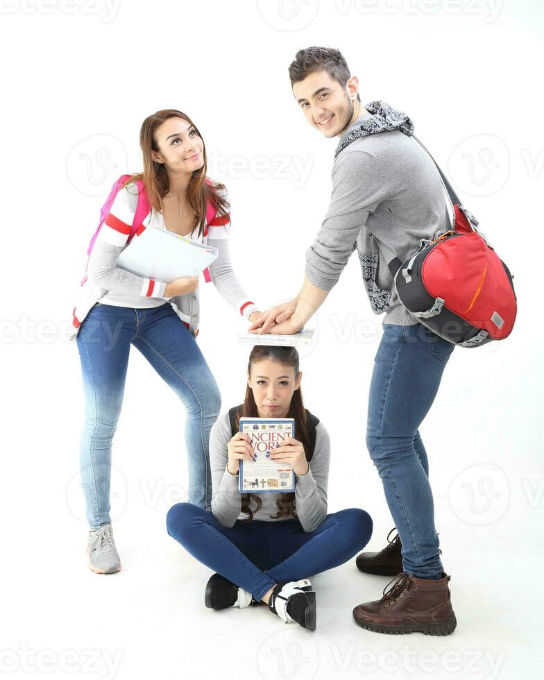 Yong south east Asian middle eastern Caucasian youth man woman in casual dress walk talk fun sit at table book notebook pen laptop computer study think read on white background photo