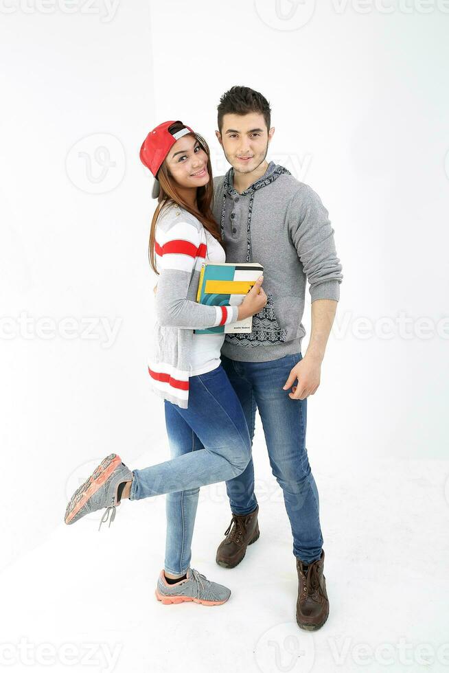 Yong south east Asian middle eastern Caucasian youth man woman in casual dress carrying book mingle talk romance white background photo