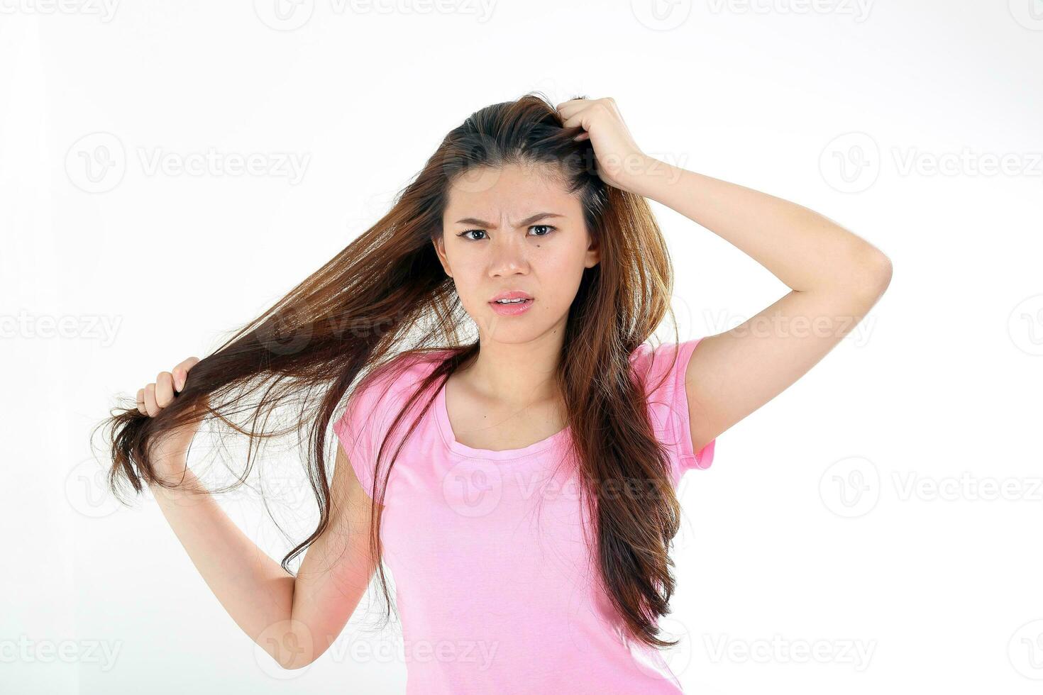 beautiful young south east Asian Chinese woman messy bad hair angry upset photo