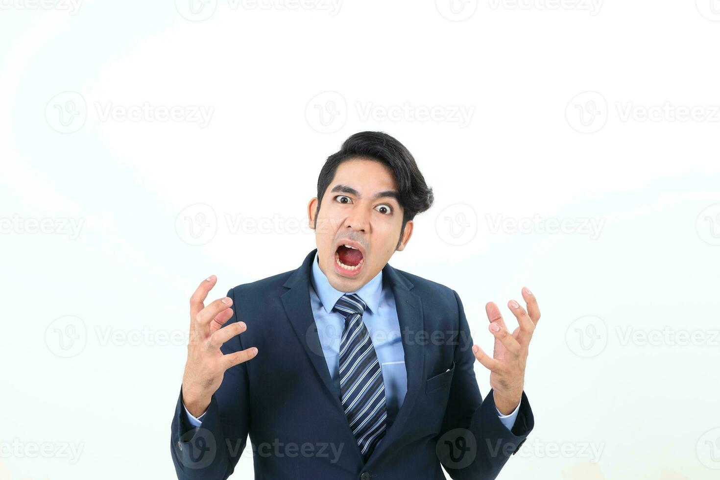 South east Asian Malay Man facial expression angry upset shocked mouth open hands look at camera photo