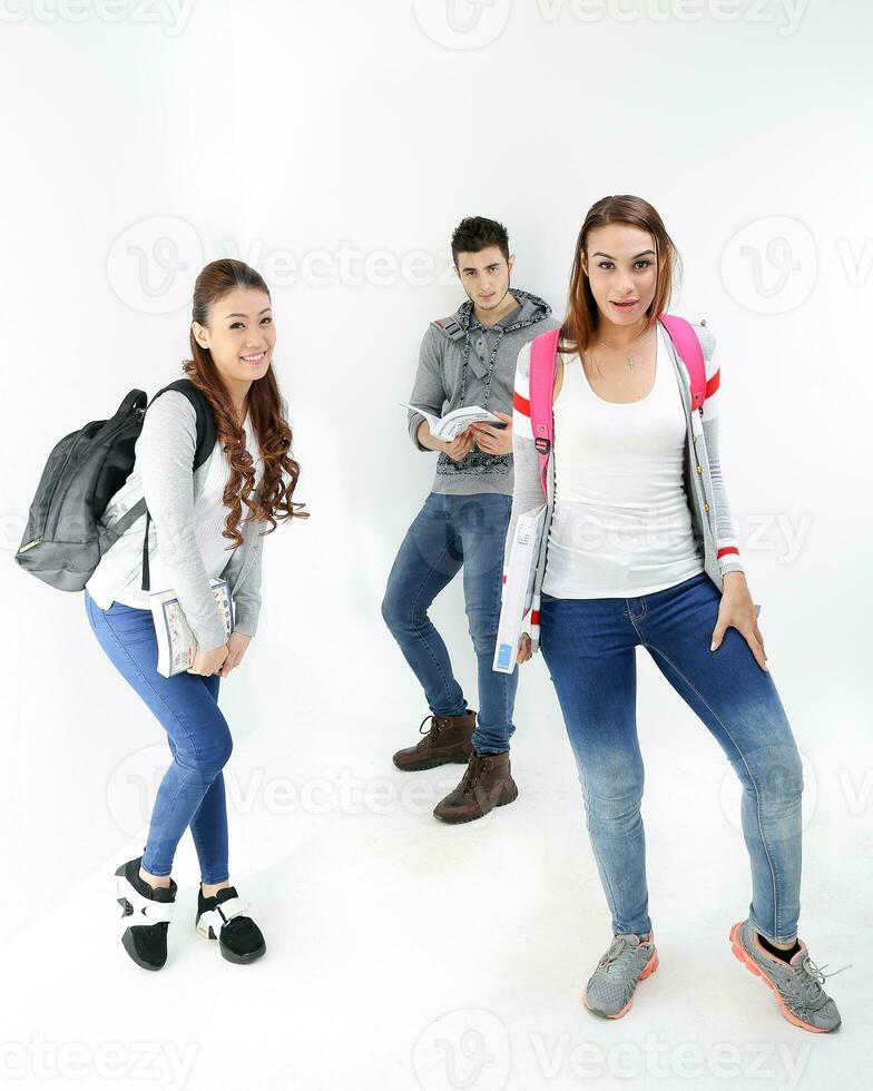 Yong south east Asian middle eastern Caucasian youth man woman in casual dress bag carrying book pose confident happy expression walk stand look at camera on white background photo