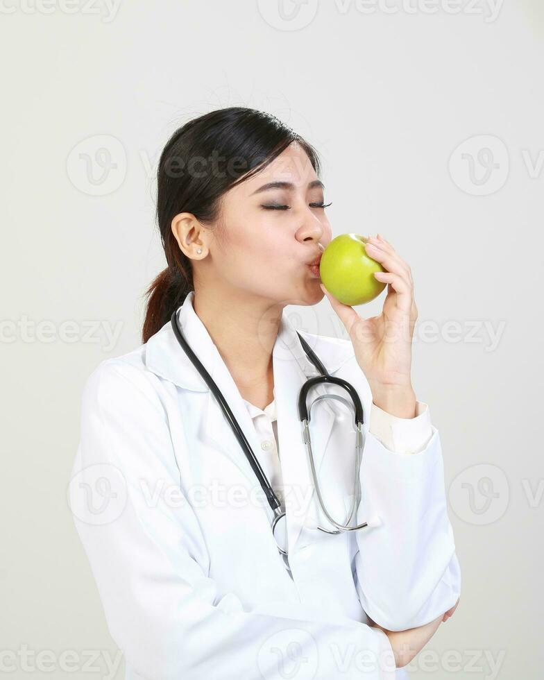 Young Asian male female doctor wearing apron uniform tunic apron hold photo