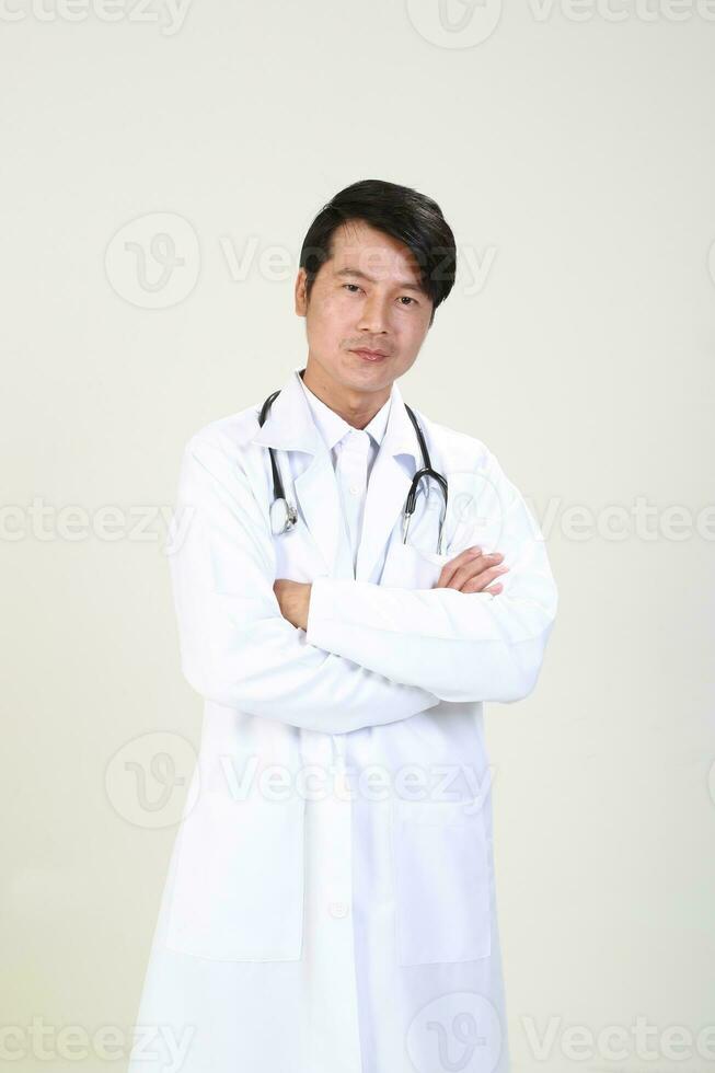 Young Asian male doctor wearing apron uniform tunic apron hold photo
