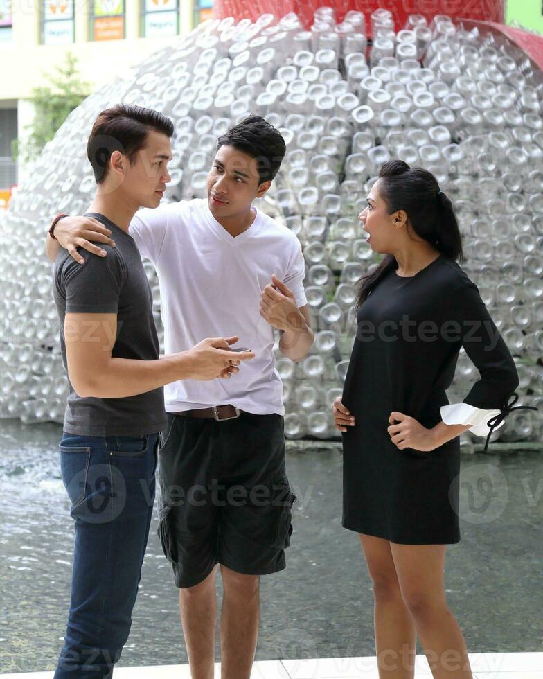 Asian young man woman friend student colleagues outdoor active work study relax photo