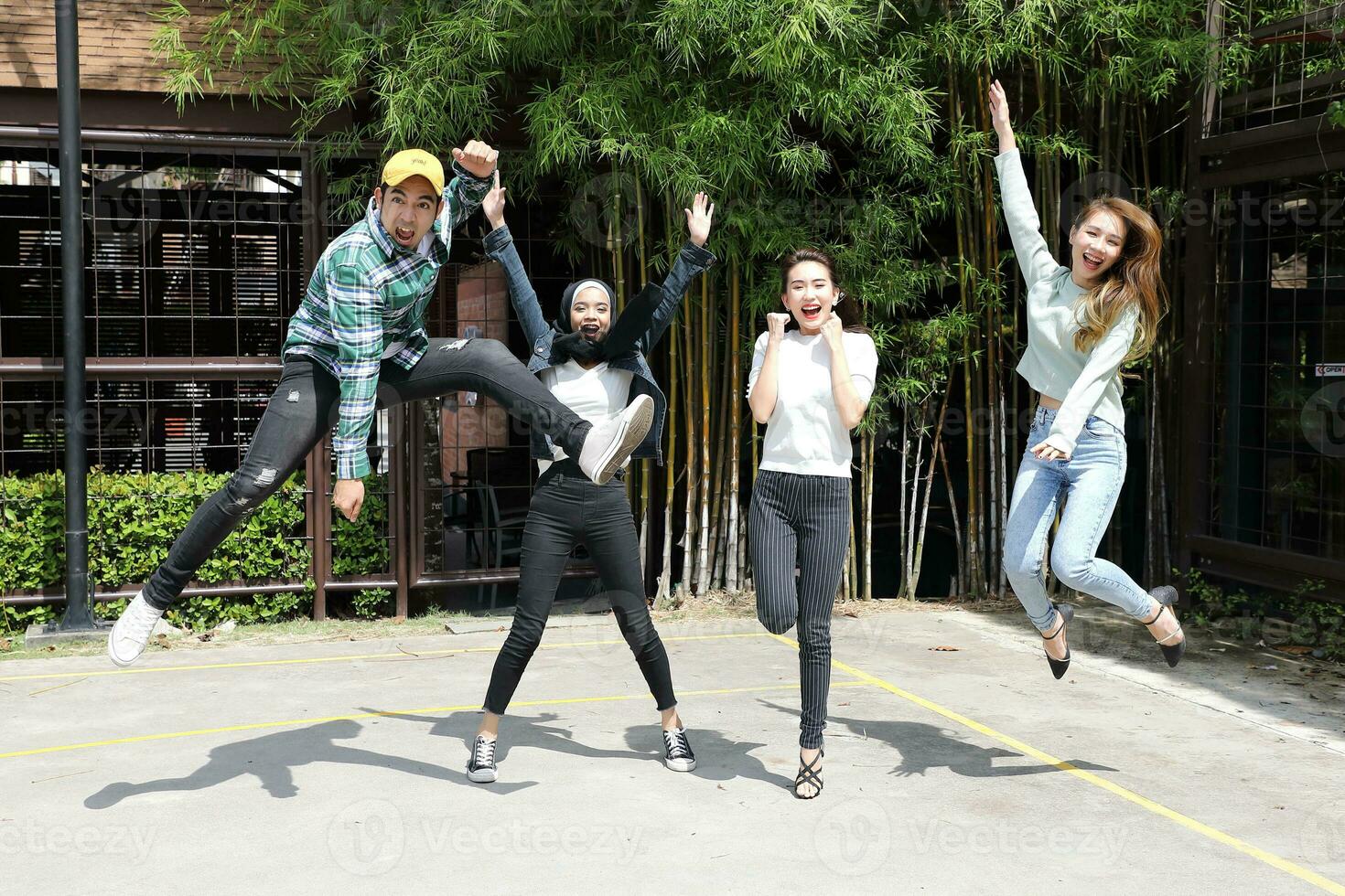Young asian malay chinese man woman indoor stair corridor campus book file folder laptop computer phone sit stand study mingle photo