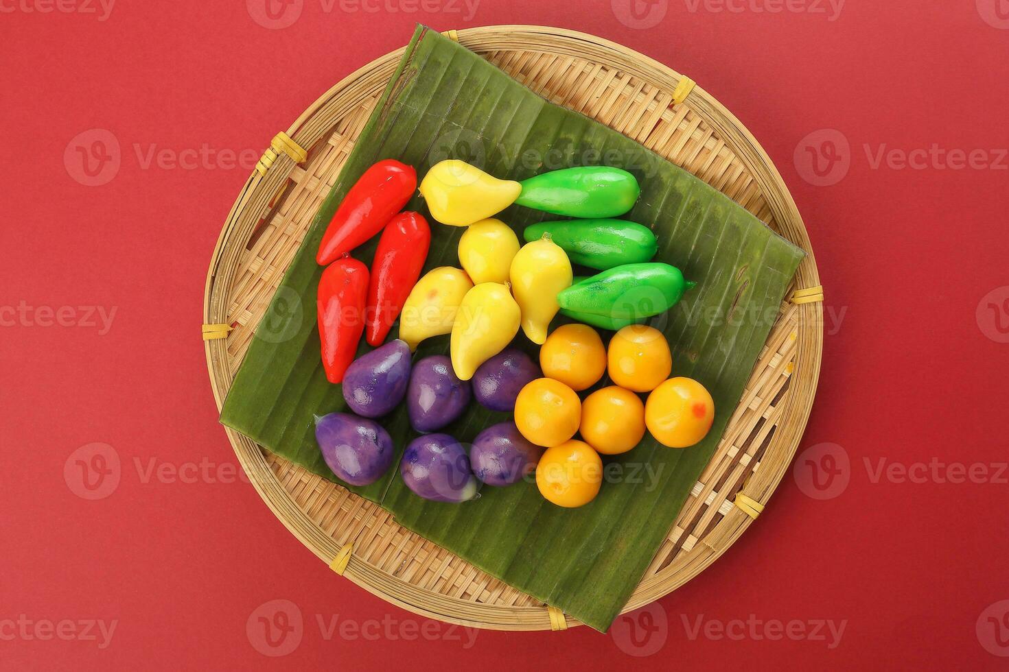 Colourful Luk chup look choop tadeonal Thai desert sweets candy creatve variety bamboo plate banana leaf photo