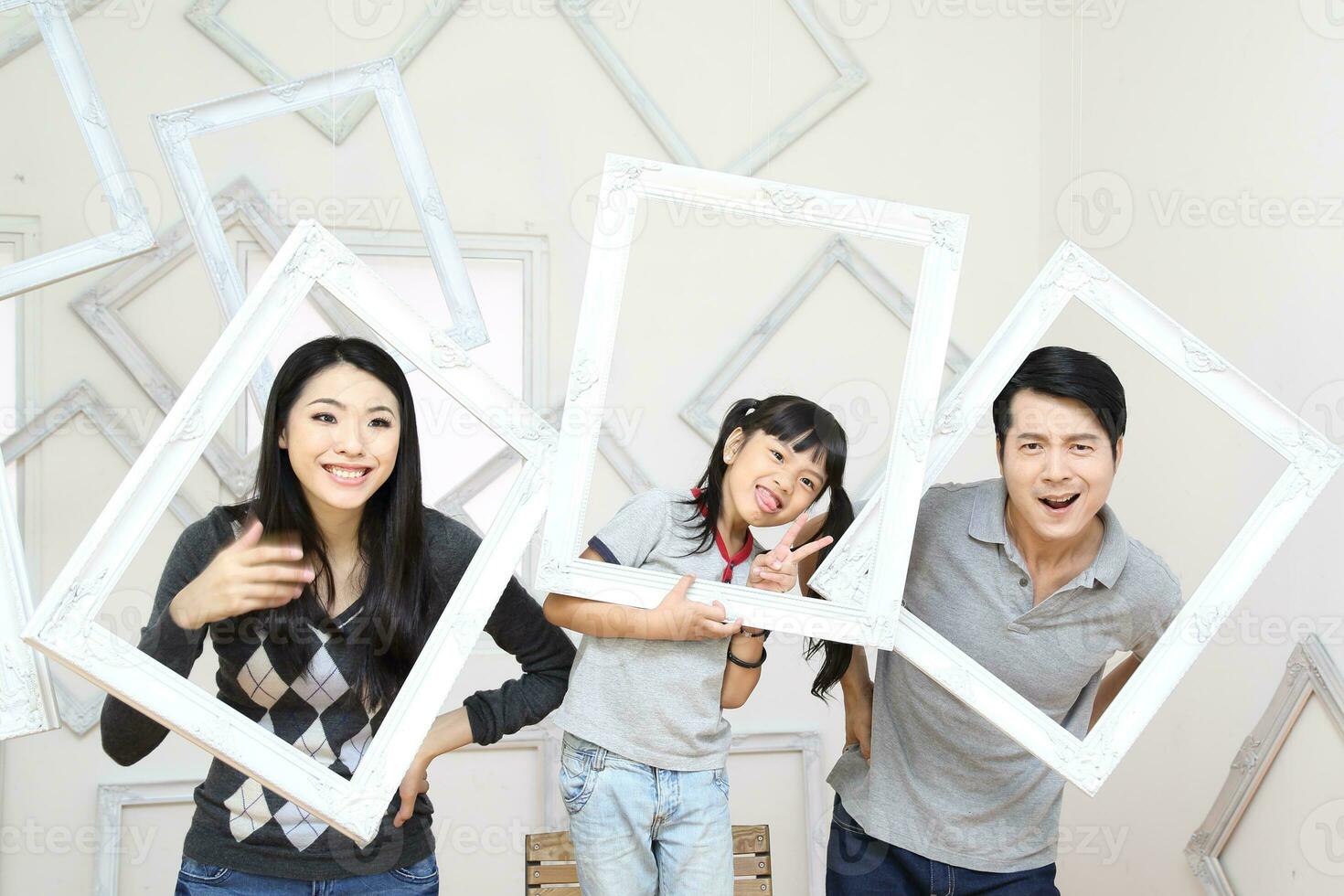 South East Asian young father mother daughter  parent girl child activity photo
