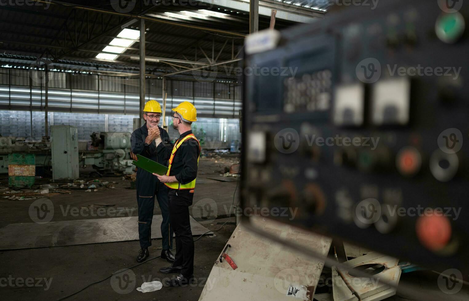 Engineers and technicians Inspect and repair mechanical systems in machine control cabinets. in order for the machine to return to normal operation photo