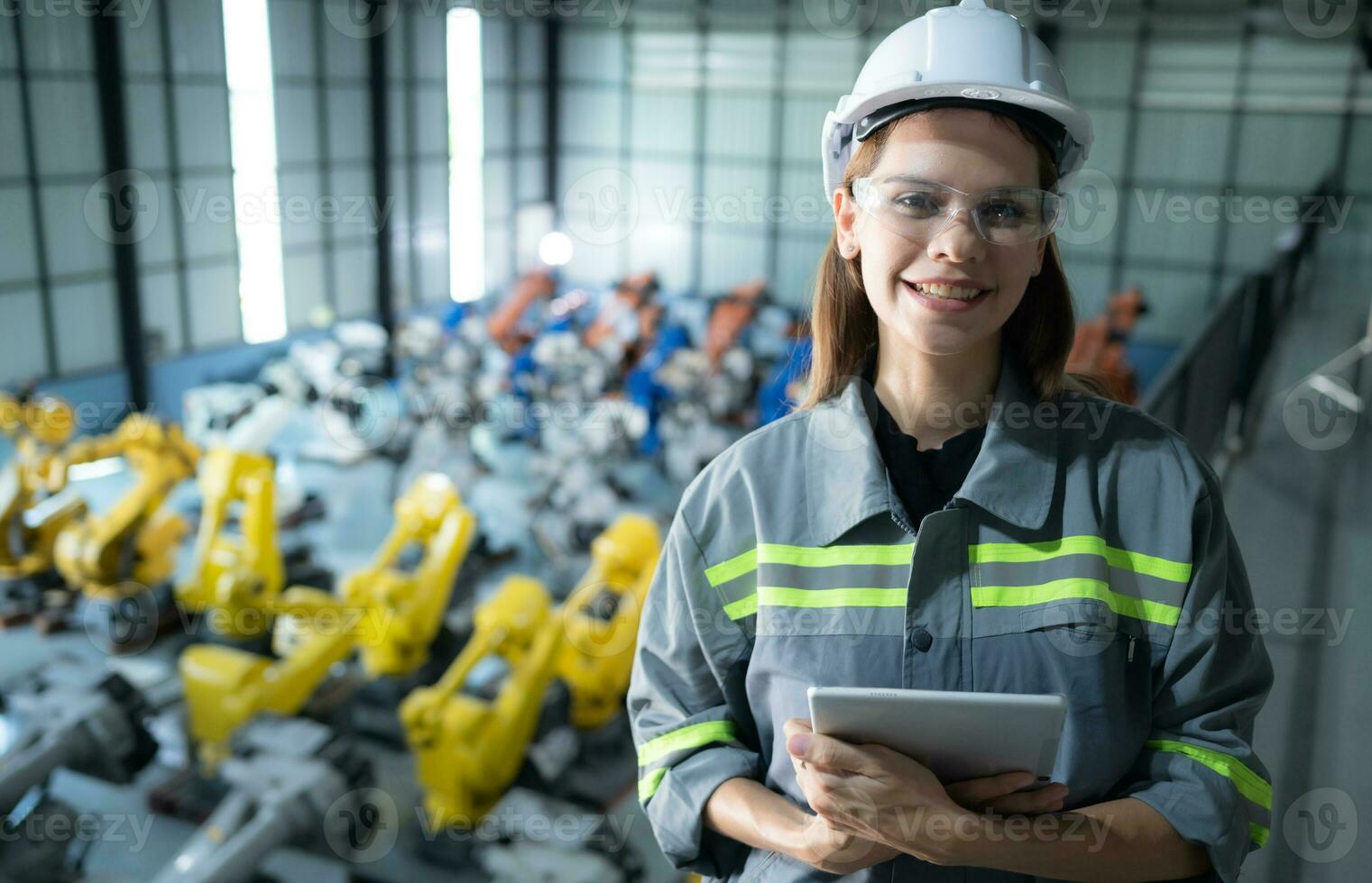 A female auditor Inspected to account for the company's robot assets that were brought to the warehouse before delivering to customers. photo
