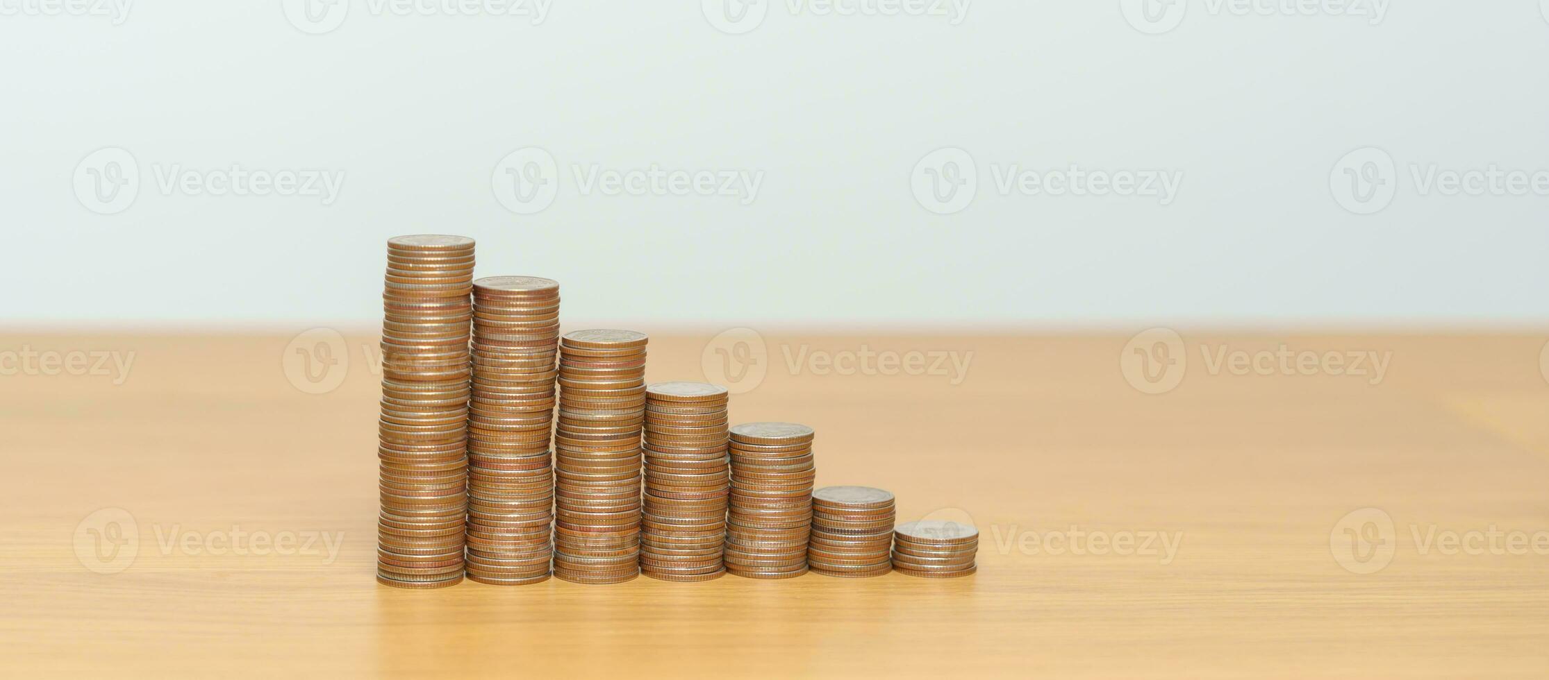 Money Saving for Future Plan, Retirement fund, Pension, Investment, Wealth Business and Financial concepts. coin stack on table, Money counting and stack arrangement for deposit photo