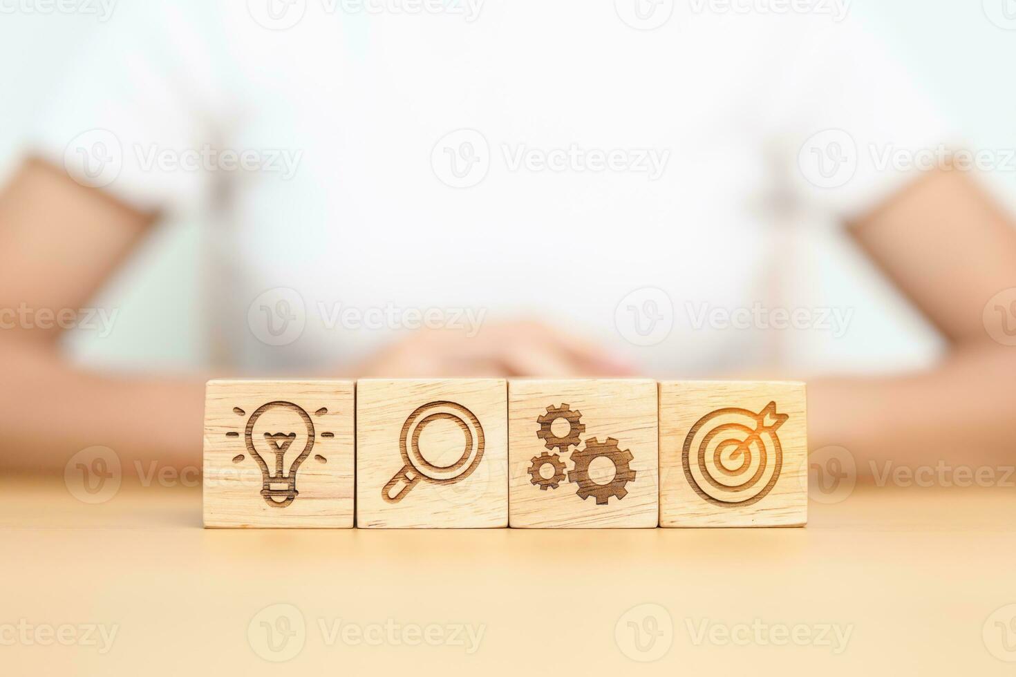dartboard, Gear, magnifying and Lightbulb icon block on table. business planning process, goal, strategy, target, mission, action, research, teamwork and idea concept photo
