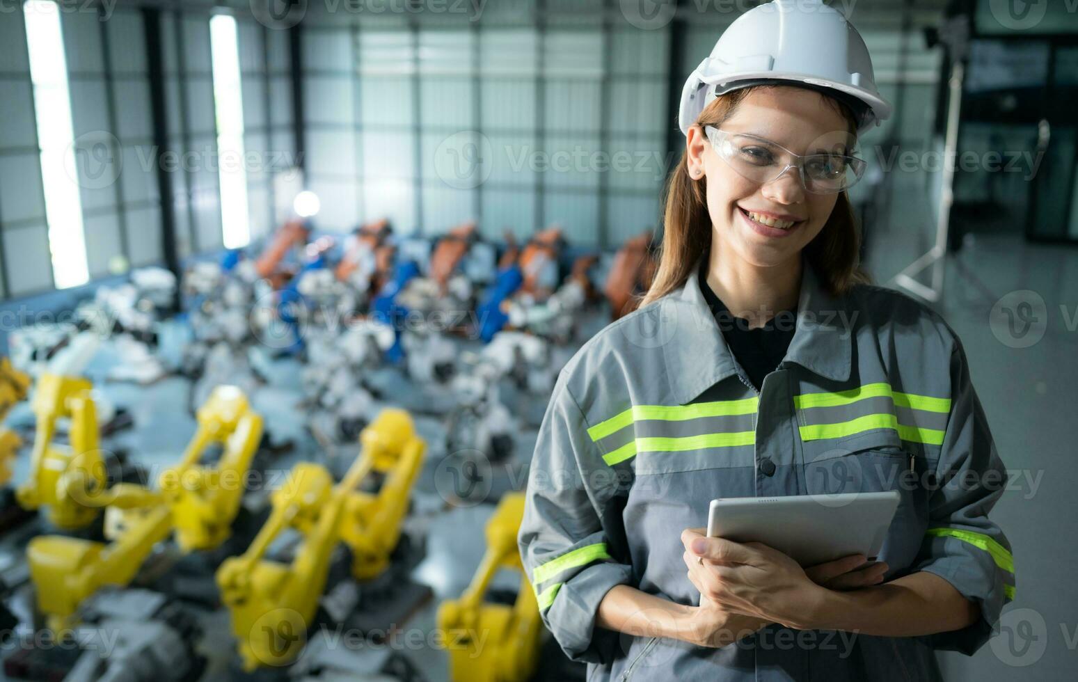 A female auditor Inspected to account for the company's robot assets that were brought to the warehouse before delivering to customers. photo