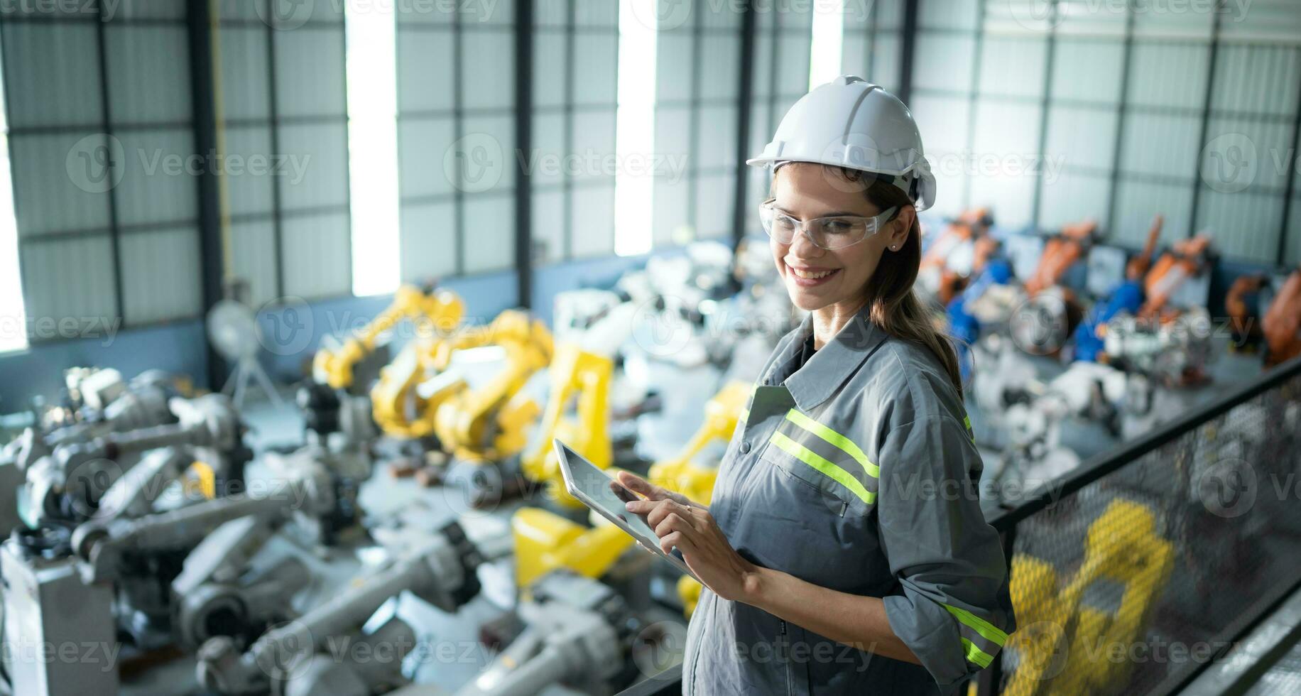 A female auditor Inspected to account for the company's robot assets that were brought to the warehouse before delivering to customers. photo