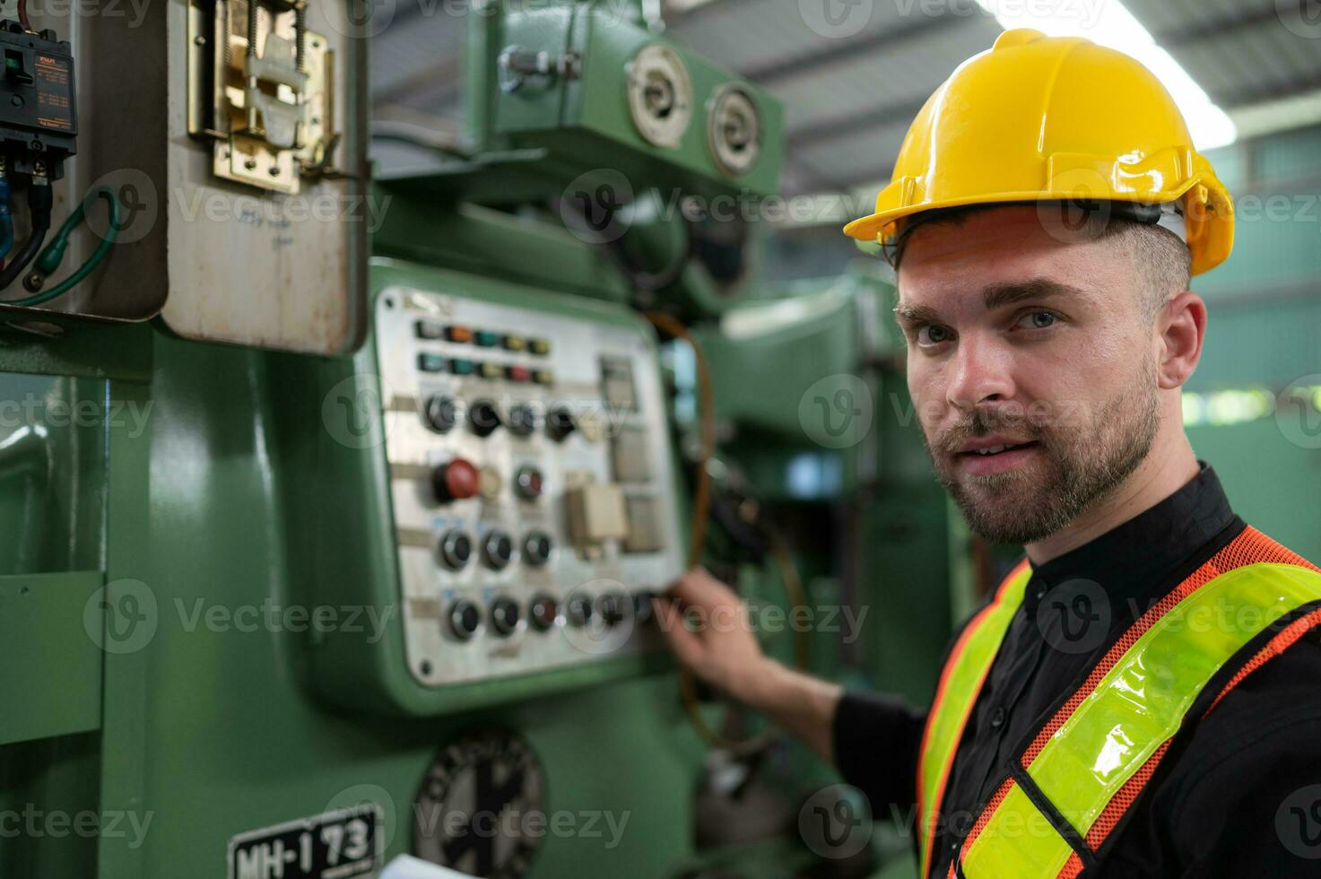 The engineer inspects the electrical system and repairs the mechanical system in the machine control cabinet. in order for the machine to return to normal operation photo
