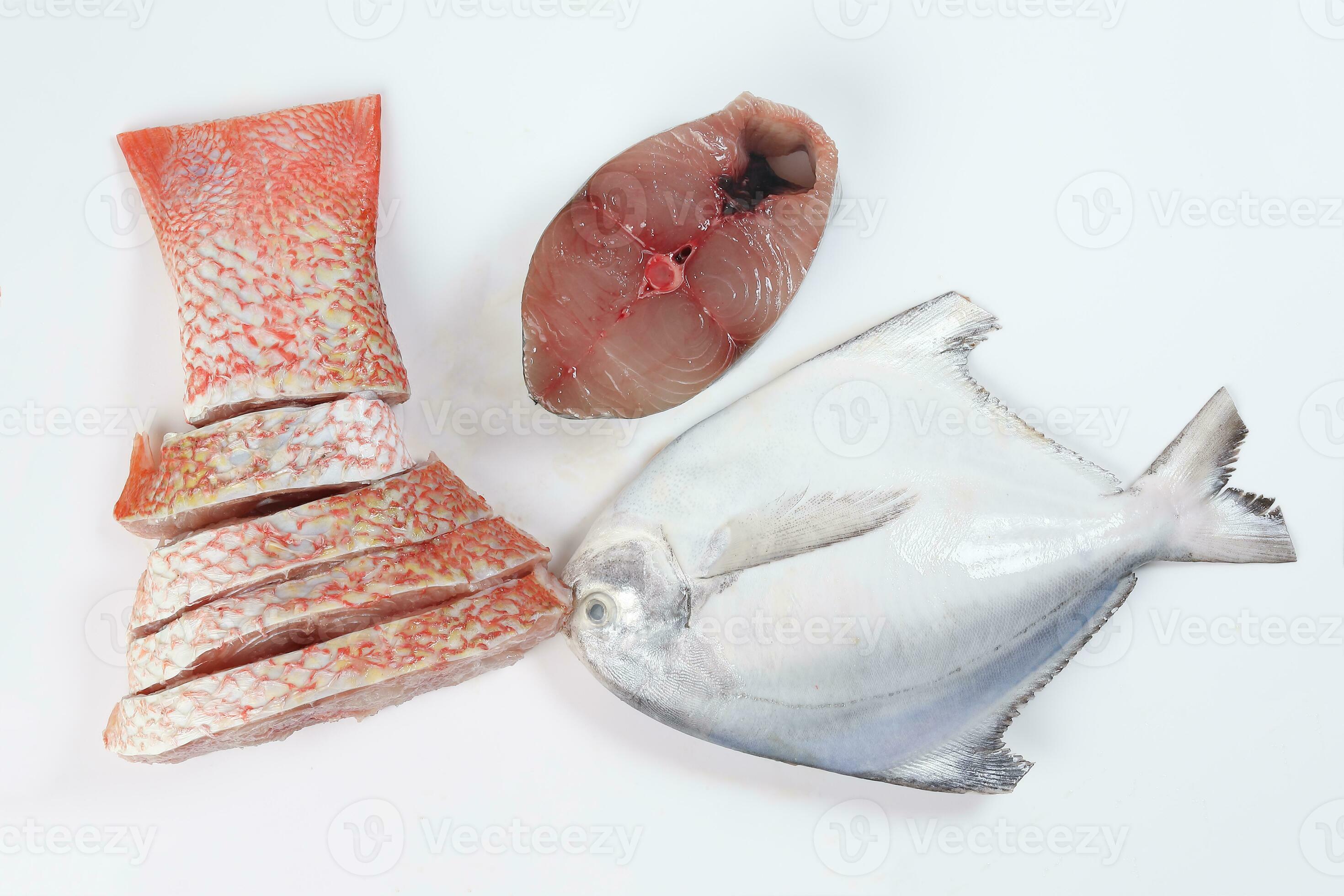 White pomfret Spanish mackerel red snapper fish cleaned descaled