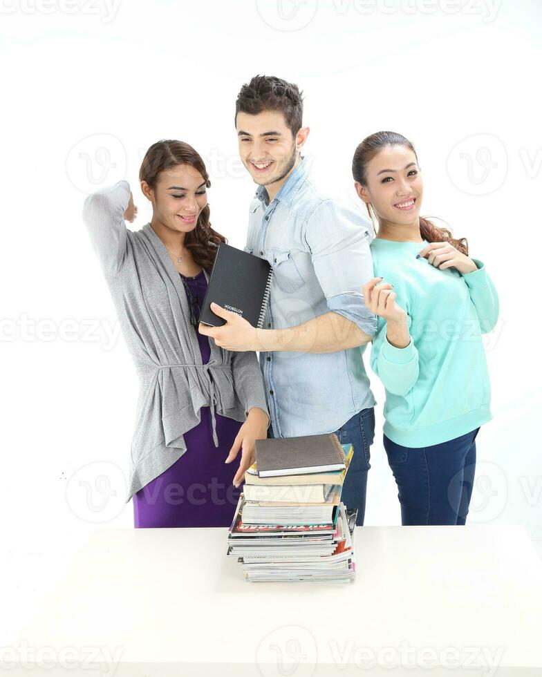 Yong south east Asian middle eastern Caucasian youth man woman in casual dress walk talk fun sit at table book notebook pen laptop computer study think read on white background photo