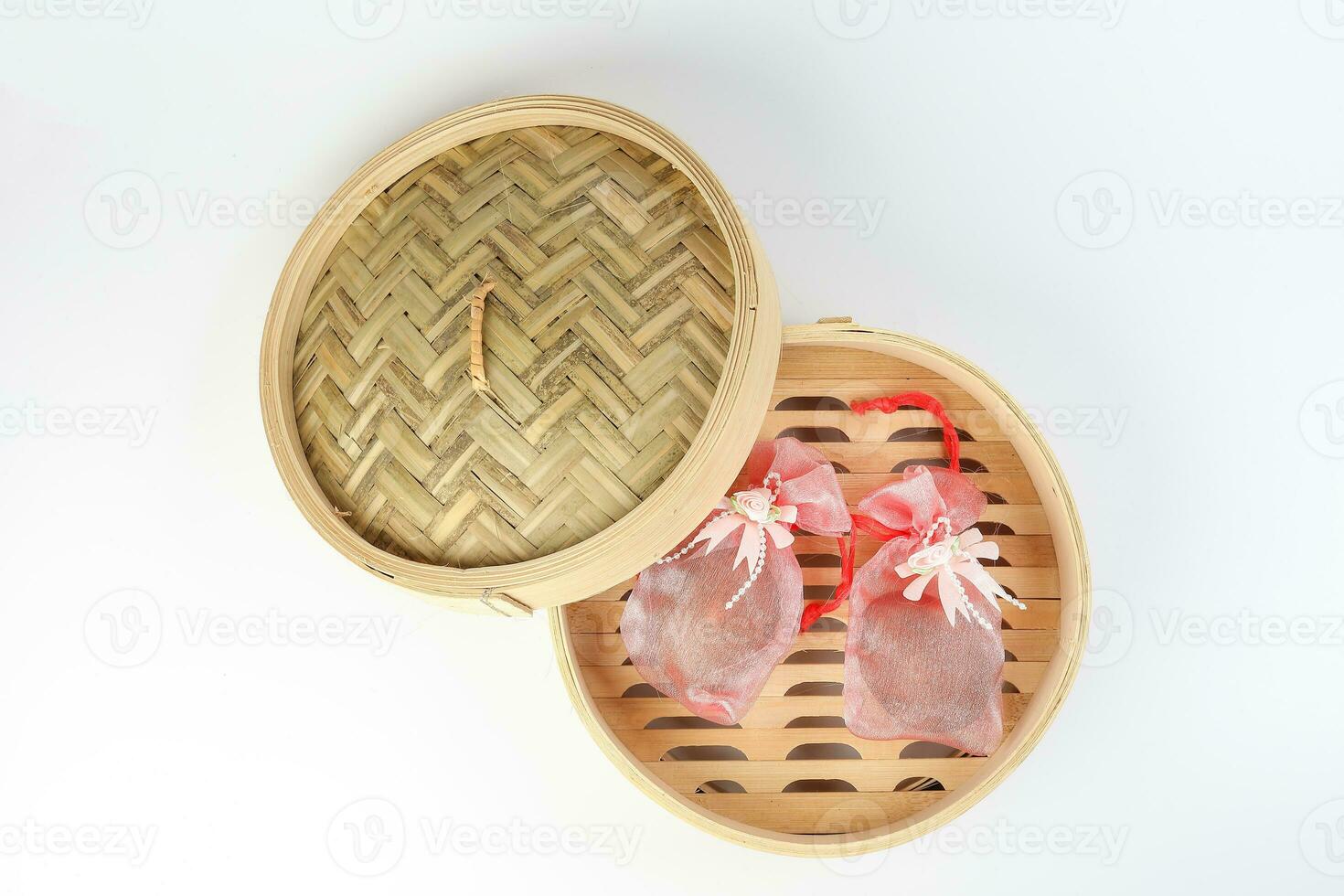 Egg flower or bunga telur a traditional malay wedding gift important part of reception door gift in bamboo steamer photo