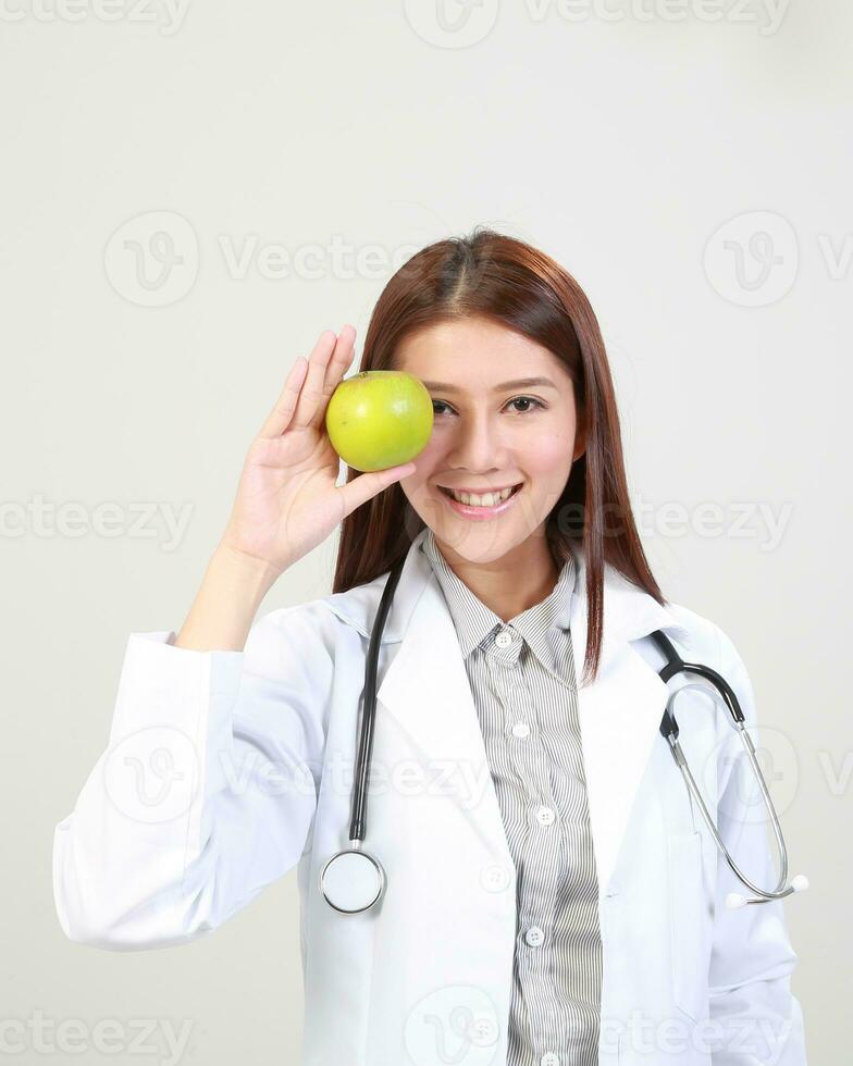Young Asian male female doctor wearing apron uniform tunic apron hold photo