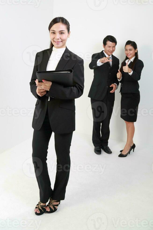 Young Asian man woman wearing business office suit stand white background photo