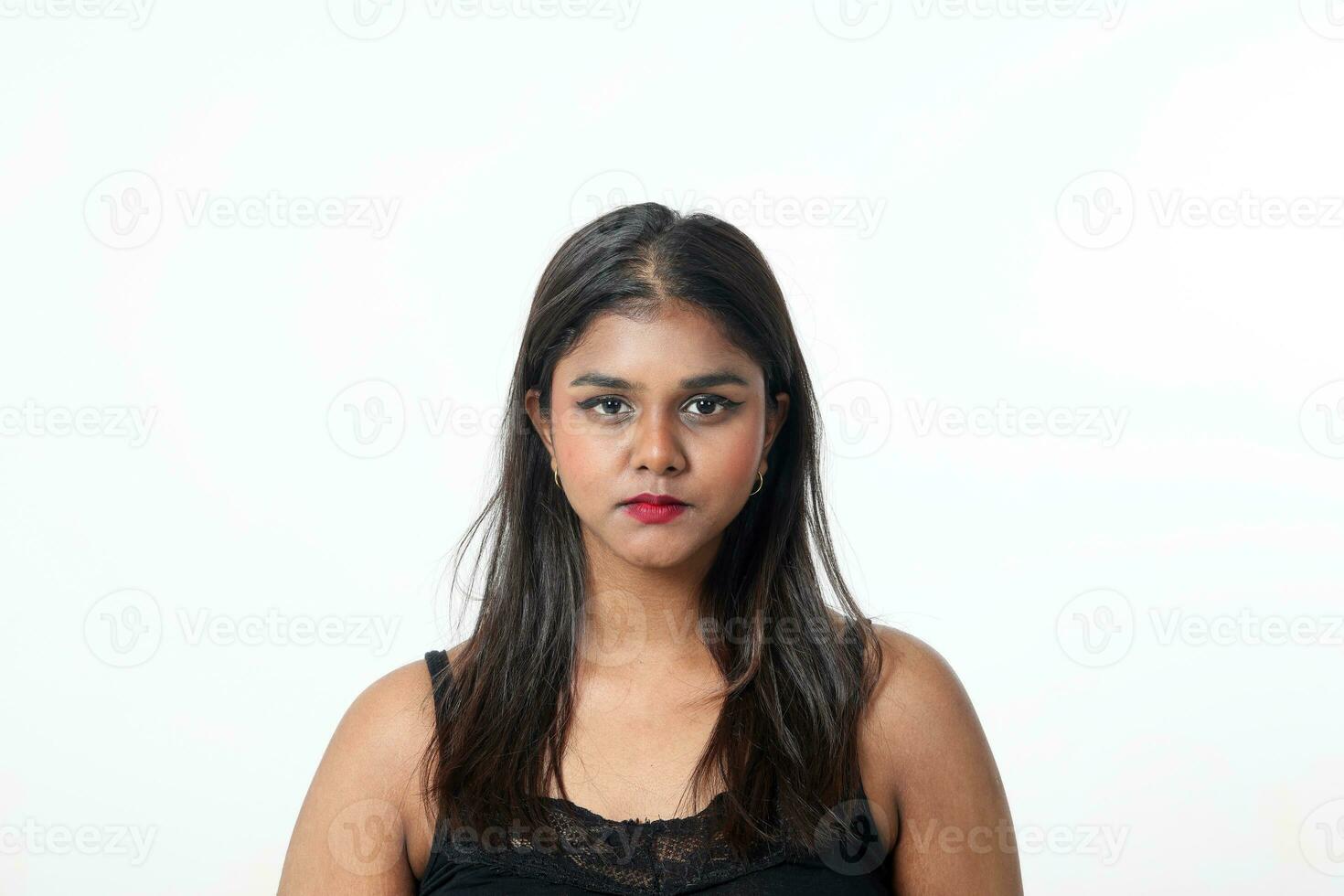 Young attractive Asian Indian woman pose face body expression mode emotion on white background plain look photo