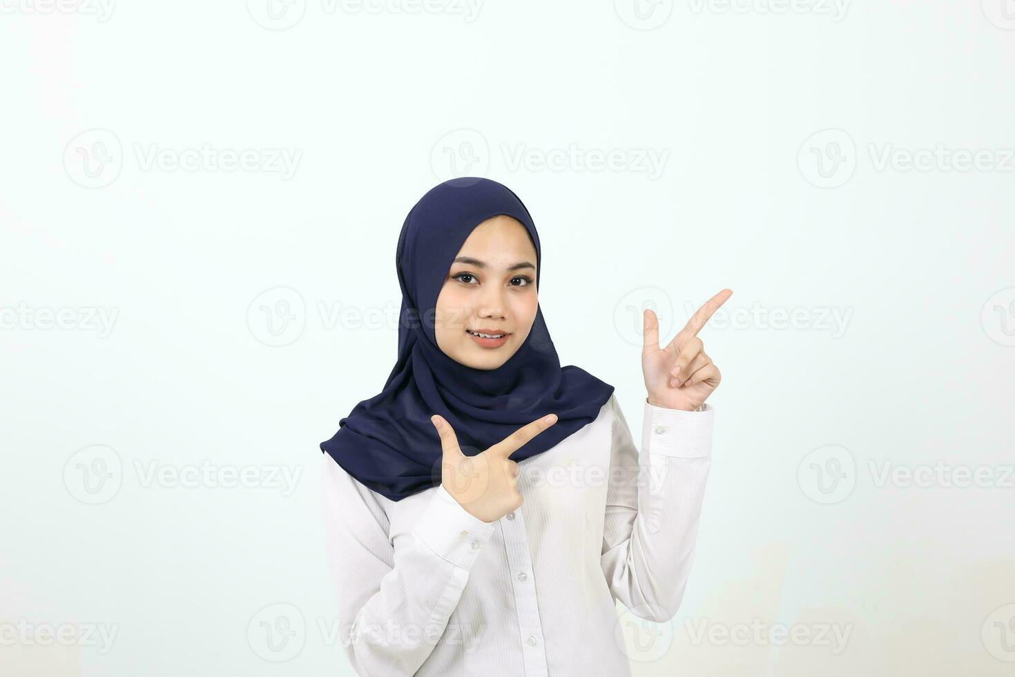 South east Asian Malay Woman headscarf facial expression show point finger up photo