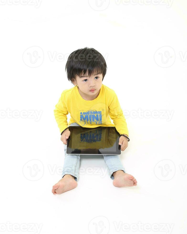 South East Asian young father mother daughter son parent boy girl child activity indoor photo