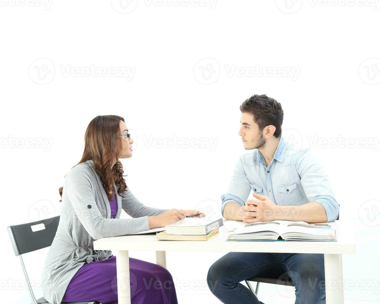 Yong south east Asian middle eastern Caucasian youth man woman in casual dress walk talk fun sit at table book notebook pen laptop computer study think read on white background photo