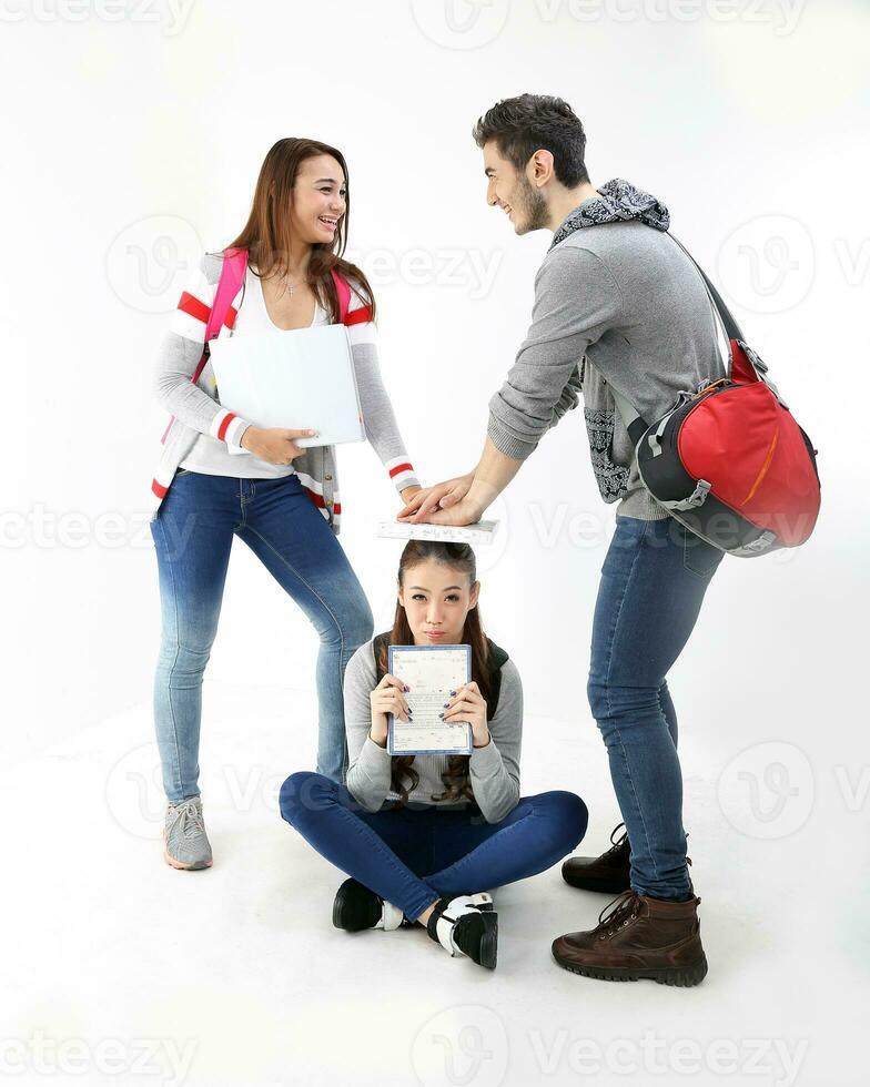 Yong south east Asian middle eastern Caucasian youth man woman in casual dress bag carrying book sit on floor stand bully ragging sad happy smile on white background photo