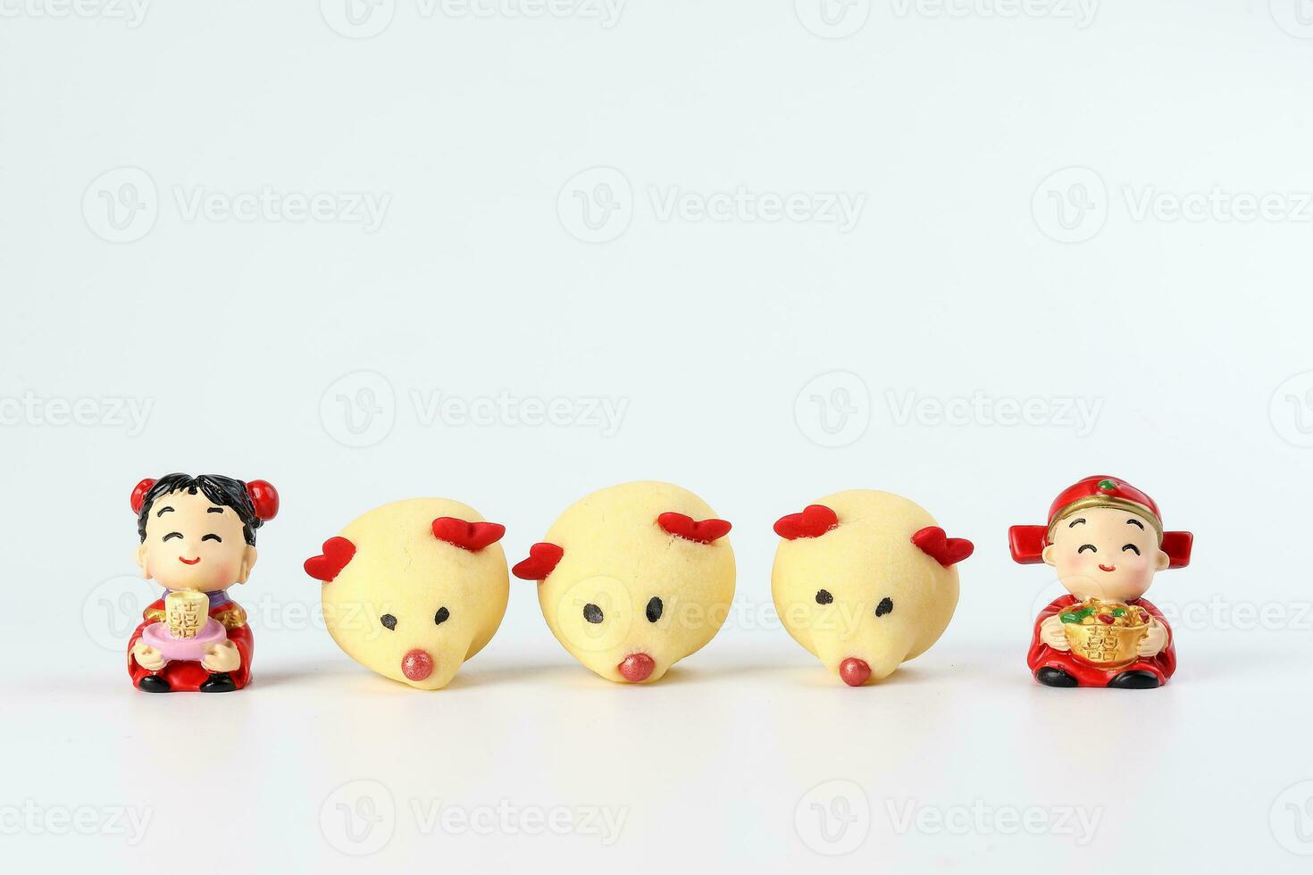 Chinese New Year rat mouse shaped cookie boy girl doll on white background photo