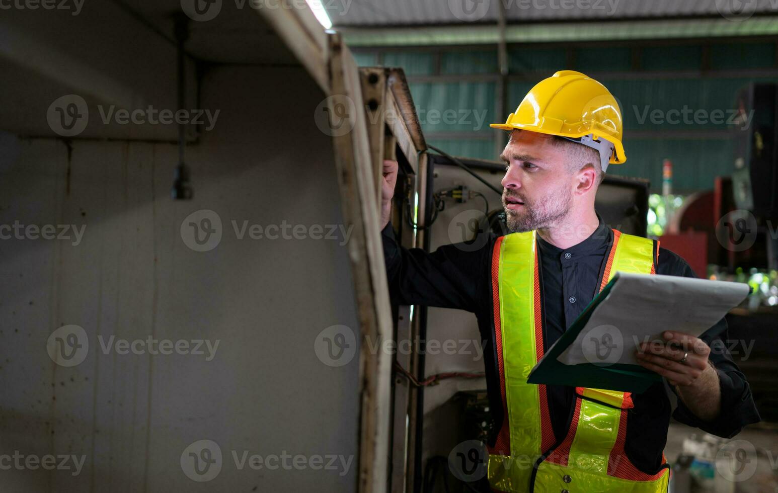 The engineer inspects the electrical system and repairs the mechanical system in the machine control cabinet. in order for the machine to return to normal operation photo