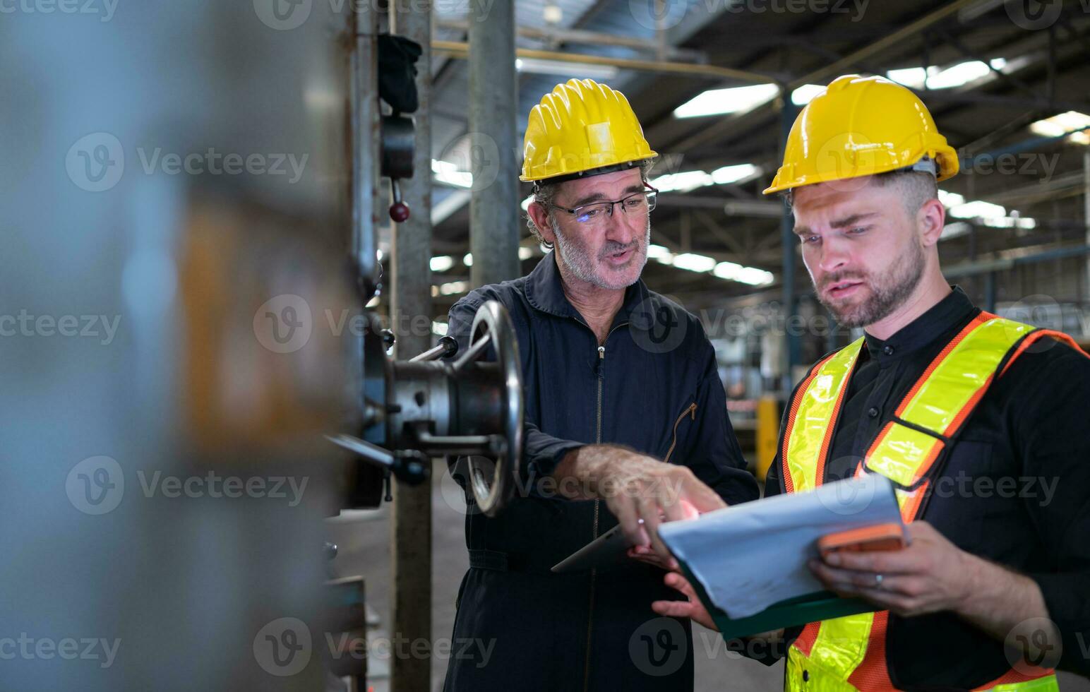 Engineers and technicians check the electrical system and repair the mechanical system in the control cabinet of the machine. in order for the machine to return to normal operation photo