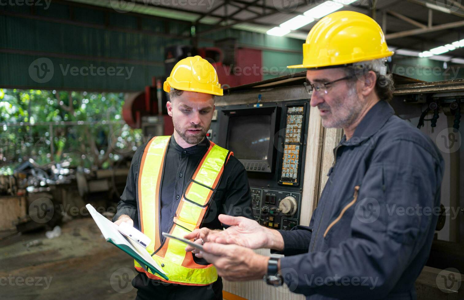 Engineers and technicians check the electrical system and repair the mechanical system in the control cabinet of the machine. in order for the machine to return to normal operation photo