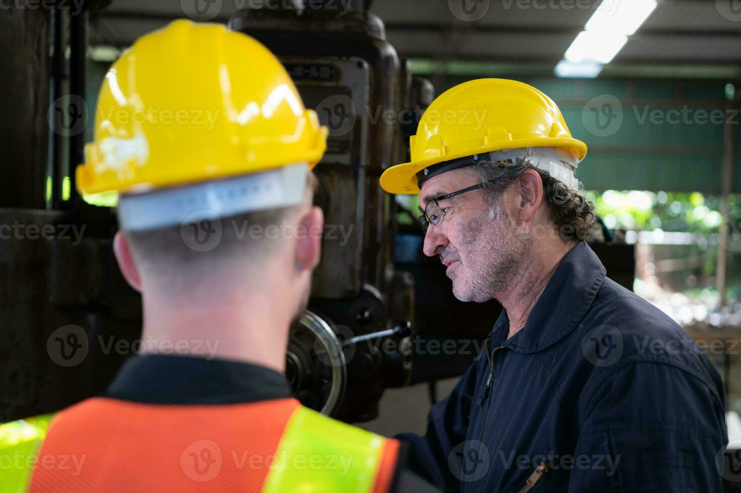 Engineers and technicians check the electrical system and repair the mechanical system in the control cabinet of the machine. in order for the machine to return to normal operation photo