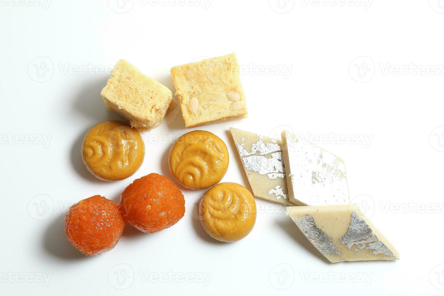 Laddu laddoo motichoor bundi  Soan papdi papri shonpapri Sandesh shondesh traditional Bengali sweets photo