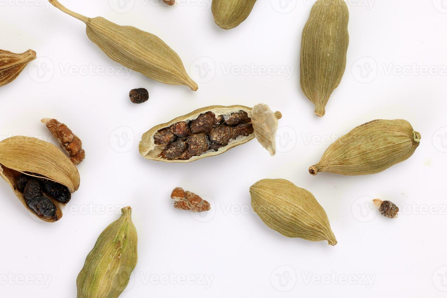 Cardamom fragrant spice seed closeup macro on white background photo