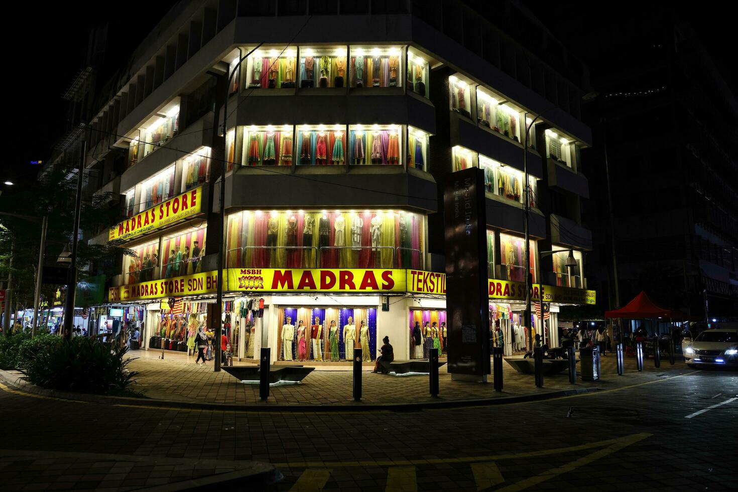 Kuala Lumpur, Malaysia-September 11, 2020- The Madras textile store on jalan masjid india lights up in the slow struggling market due to pandemic covid-19 photo